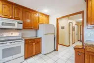 1461 S Shore Drive, Southport, NC 28461 — 3-bedroom waterfront home, Southport, NC, photo 24 of 75: Stove & Frigerator