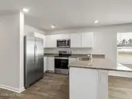 5791 Harebell Road Unit 150, Leland, NC 28451 — 4-bedroom townhome in SeaBrooke, Leland, NC, photo 11 of 51: 10 kitchen (5)