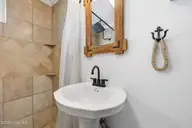100 E Bogue Sound Drive, Atlantic Beach, NC 28512 — 4-bedroom waterfront home, Atlantic Beach, NC, photo 18 of 52: bathroom