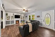 5203 Meadowbrook Drive, Trent Woods, NC 28562 — 3-bedroom home in Country Club Park, Trent Woods, NC, photo 12 of 61: Living Room