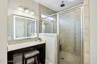 6988 Ascension Drive SW, Ocean Isle Beach, NC 28469 — 3-bedroom home in Sunset Ridge, Ocean Isle Beach, NC, photo 19 of 37: Lighted dressing table