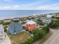 100 9th Street, Emerald Isle, NC 28594 — 6-bedroom waterfront home in Emerald Isle By The Sea, Emerald Isle, NC, photo 11 of 64: Aerial Towards Ocean