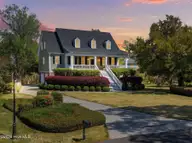 108 Rice Hope Run, Leland, NC 28451 — 5-bedroom home in Rice Hope, Leland, NC, photo 2 of 51: 001_108_rice_hope_run_twilight-1_779
