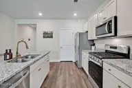 1325 Clendon Circle, Leland, NC 28451 — 3-bedroom home in Brunswick Forest, Leland, NC, photo 20 of 56: Kitchen - Gas Stove