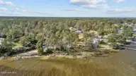 211 S River Drive, Beaufort, NC 28516 — waterfront lot in Sportsman Village, Beaufort, NC, photo 9 of 25: 8-web-or-mls-DJI_20241115131125_0974_D