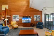 142 Lagoon Lane, Pine Knoll Shores, NC 28512 — 3-bedroom waterfront condo in Mcginnis Point, Pine Knoll Shores, NC, photo 23 of 41: Living Room