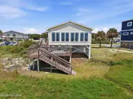 407 Ocean Drive, Oak Island, NC 28465 — 3-bedroom waterfront home in Yaupon Beach, Oak Island, NC, photo 1 of 52