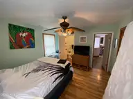 3518 E Beach Drive, Oak Island, NC 28465 — 3-bedroom waterfront home in E. Long Beach, Oak Island, NC, photo 16 of 39: IMG_4293
