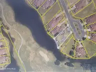 6943 64 Rosebury Court SW, Ocean Isle Beach, NC 28469 — waterfront lot in Ocean Ridge Plantation, Ocean Isle Beach, NC, photo 1 of 28