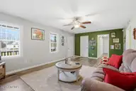 101 Shilou Drive, Pikeville, NC 27863 — 3-bedroom home in Sparrow Point, Pikeville, NC, photo 5 of 34: 101 Shilou Dr-Living Room 4