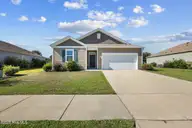 420 St Kitts Way, Winnabow, NC 28479 — 3-bedroom home in Mallory Creek Plantation, Winnabow, NC, photo 1 of 33: Front