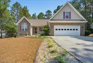7 Moore Drive, Pinehurst, NC 28374 — 3-bedroom home in Village Acres, Pinehurst, NC, photo 1 of 38: 7 Moore Dr