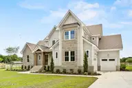523 Ballast Point Road, Hampstead, NC 28443 — 5-bedroom waterfront home in Sloop Point Plantation, Hampstead, NC, photo 2 of 61: 2_front exterior