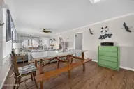 501 W Beach Drive, Oak Island, NC 28465 — 3-bedroom waterfront home in Long Beach, Oak Island, NC, photo 6 of 60