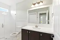 1454 Dunes Boulevard SW, Ocean Isle Beach, NC 28469 — 4-bedroom home in Retreat At OIB, Ocean Isle Beach, NC, photo 24 of 52: Shared 1st floor guest bath