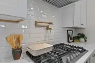 1240 Burning Tree Road, Pinehurst, NC 28374 — 4-bedroom home in Unit 12, Pinehurst, NC, photo 23 of 48: 36" Gas Cooktop & Pot Filler