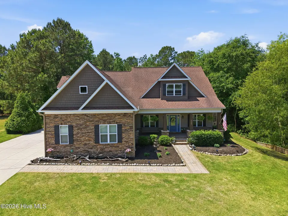 135 Otway Burns Drive, Swansboro, NC 28584 — 4-bedroom home in White Oak Crossing, Swansboro, NC, photo 1 of 73: 83-web-or-mls-DJI_20260505122237_0117_D