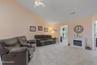 300 Sunset Oaks Lane 4, Sunset Beach, NC 28468 — 3-bedroom townhome in Sunset Oaks Garden Homes, Sunset Beach, NC, photo 24 of 44: Living room