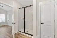 210 S Umbrella Palm Drive, Hampstead, NC 28443 — 3-bedroom home in Southwater Village, Hampstead, NC, photo 13 of 17: Southeast_Blanco_L_014