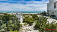 2 Conch Lane, Wrightsville Beach, NC 28480 — 4-bedroom home in Shell Island, Wrightsville Beach, NC, photo 4 of 41: 034_dji_20260408131247_0070_d_224