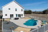 456 Pointe Vista Drive, Elizabeth City, NC 27909 — 4-bedroom waterfront home in The Waters At Sunset Pointe, Elizabeth City, NC, photo 2 of 49: 64-456 Pointe Vista - Drone-19