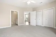 613 Elfin Court, Leland, NC 28479 — 2-bedroom townhome in Westport, Leland, NC, photo 17 of 28: Primary Bedroom