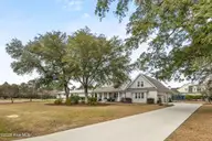 102 Olde Point Loop, Hampstead, NC 28443 — 4-bedroom waterfront home in Olde Point, Hampstead, NC, photo 1 of 70: 2_front exterior