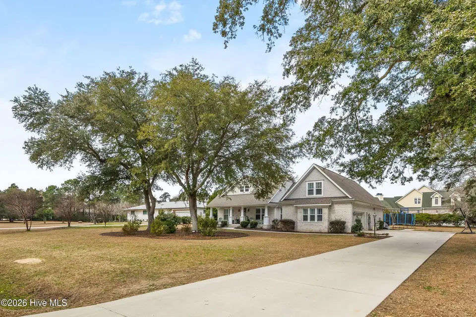 102 Olde Point Loop, Hampstead, NC 28443 — 4-bedroom waterfront home in Olde Point, Hampstead, NC, photo 1 of 70: 2_front exterior