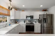 737 Fort Fisher Boulevard N, Kure Beach, NC 28449 — 4-bedroom waterfront home in Kure Estates, Kure Beach, NC, photo 10 of 53: 737FtFisherBlvdN-111