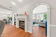 3808 Rainbow Street, Greenville, NC 27834 — 4-bedroom home in Shamrock, Greenville, NC, photo 7 of 56: living room fireplace