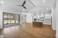 1213 Rockhill Road, Castle Hayne, NC 28429 — 4-bedroom waterfront home in Sunset Reach, Castle Hayne, NC, photo 23 of 63: 22_living room