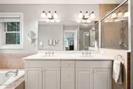 906 Jewell Court, New Bern, NC 28560 — 4-bedroom waterfront home in Fairfield Harbour, New Bern, NC, photo 18 of 52: Primary vanity
