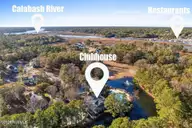 9290 100 Cargill Drive, Calabash, NC 28467 — lot in Devaun Park, Calabash, NC, photo 17 of 43: Clubhouse - River - Restaurants