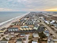 918 N New River Drive 322, Surf City, NC 28445 — 1-bedroom condo in Surf Condominiums, Surf City, NC, photo 8 of 38: DJI_20250220173413_0669_D