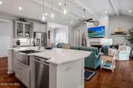 141 Clubhouse Road, Sunset Beach, NC 28468 — 4-bedroom home in Sea Trail Plantation, Sunset Beach, NC, photo 14 of 59: Kitchen Island