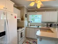 2807 Arendell Street, Morehead City, NC 28557 — 2-bedroom waterfront home in Morehead Bluffs, Morehead City, NC, photo 9 of 69: Kitchen