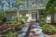 12 Whithorn Court, Pinehurst, NC 28374 — 3-bedroom home in Pinewild CC, Pinehurst, NC, photo 3 of 33: ExteriorEntry