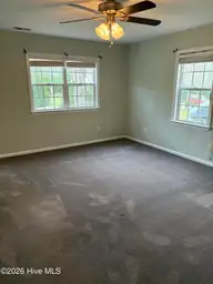102 Dockside Drive, Jacksonville, NC 28546 — 4-bedroom waterfront home in Hunters Creek, Jacksonville, NC, photo 17 of 33: master bed