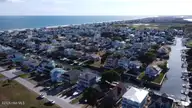 147 Swordfish Drive, Holden Beach, NC 28462 — 5-bedroom waterfront home, Holden Beach, NC, photo 12 of 12: drone view