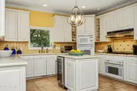 150 Quail Hollow Drive, Pinehurst, NC 28374 — 3-bedroom waterfront home in CCNC, Pinehurst, NC, photo 20 of 53: 26Kitchen