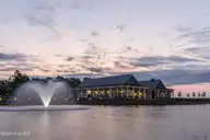 217 Paddle Court, Wilmington, NC 28412 — 3-bedroom home in Riverlights, Wilmington, NC, photo 20 of 25: Lakehouse Dusk