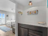9201 Coast Guard Road C101, Emerald Isle, NC 28594 — 3-bedroom waterfront condo in Pebble Beach, Emerald Isle, NC, photo 14 of 41: Bar Area