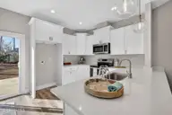 9579 Lily Pond Court NE, Leland, NC 28451 — 3-bedroom home in Lily Pond, Leland, NC, photo 13 of 33: Quartz countertops