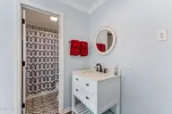 3350 Club Villas Drive # 405, Southport, NC 28461 — 2-bedroom condo in St James, Southport, NC, photo 21 of 39: newer vanity