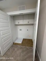 316 Hawks Bluff Drive, New Bern, NC 28560 — 3-bedroom home in Falcon Bridge, New Bern, NC, photo 12 of 21: Upstairs Laundry