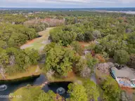 187 69 Clubhouse Drive SW, Supply, NC 28462 — waterfront lot in Lockwood Folly, Supply, NC, photo 17 of 27: DJI_0081