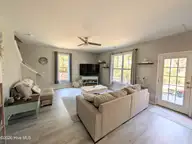 114 Lumis Court, Hampstead, NC 28443 — 4-bedroom home in Dogwood Lakes, Hampstead, NC, photo 13 of 26: living room