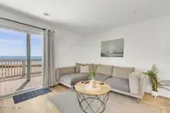 1003 Pelican Court 1003, Kure Beach, NC 28449 — 3-bedroom waterfront condo in Ocean Dunes, Kure Beach, NC, photo 10 of 45: 1003 Pelican Ct-large-014-030-Main Livin