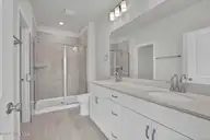 6787 Fellowship Drive, Leland, NC 28451 — 4-bedroom townhome in Grand Park, Leland, NC, photo 15 of 46: Primary Bath