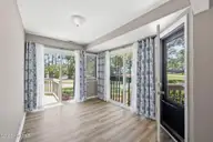 7601 Windward Drive, New Bern, NC 28560 — 3-bedroom waterfront condo in Fairfield Harbour, New Bern, NC, photo 16 of 52: Family Room Area